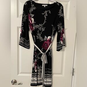Women’s black floral design dress Sandra Darren size large
